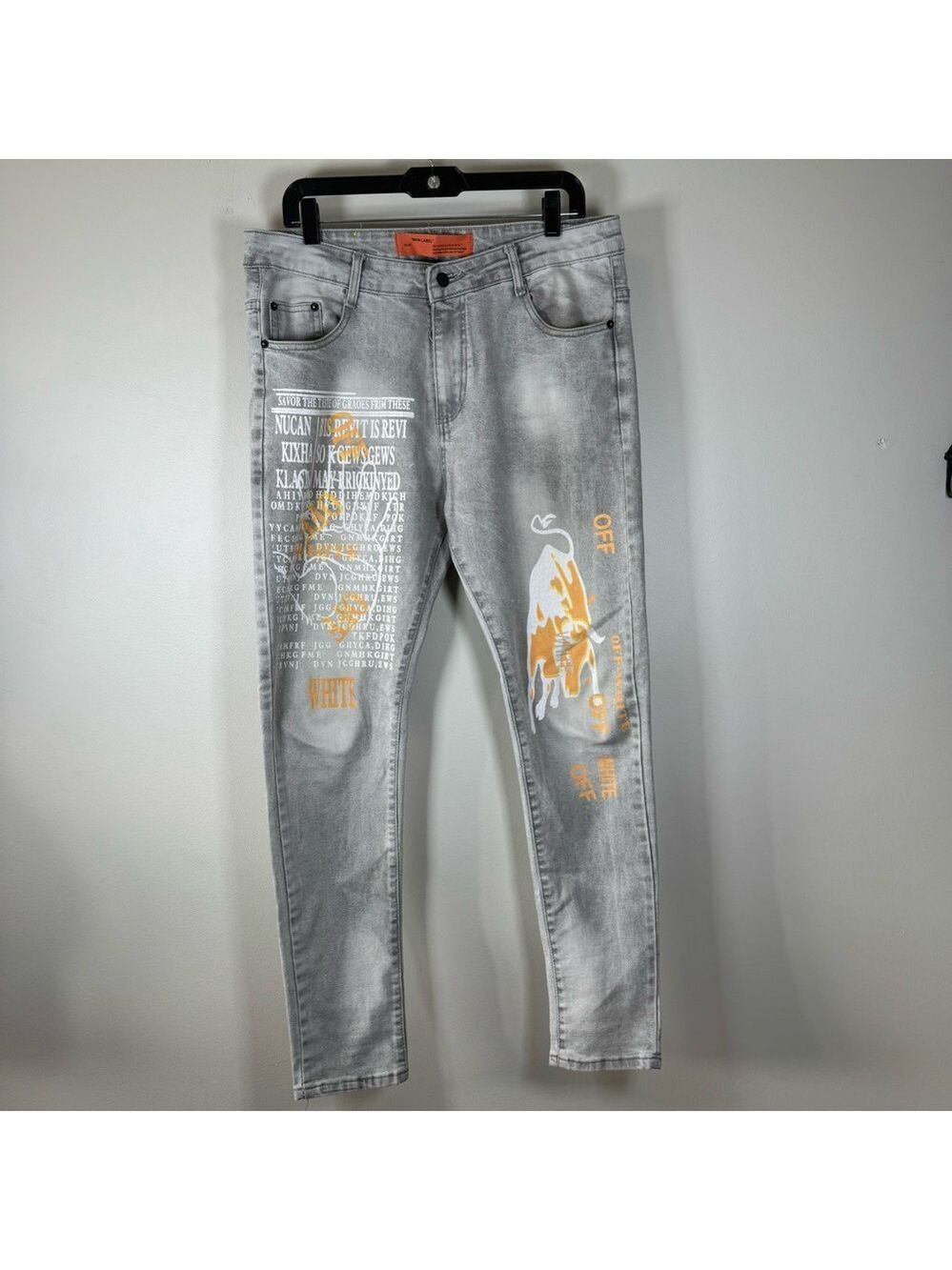 Off-White Light Gray Skinny Jeans with Orange Accents. 36